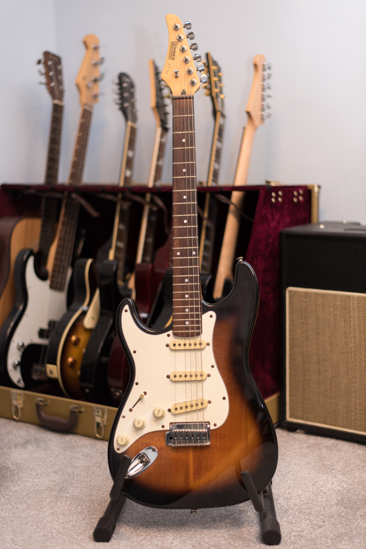 Buying your first guitar - Hohner ST59 Guitar on a guitar stand