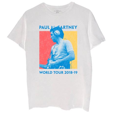 A T-Shirt featuring Paul McCarney holding a left handed guitar. The t-shirt's text reads "Paul McCartney" at the top and "World Tour 2018-19" at the bottom. The photo of Paul is in blue and white. The background is red on the left of his image and yellow to the right.