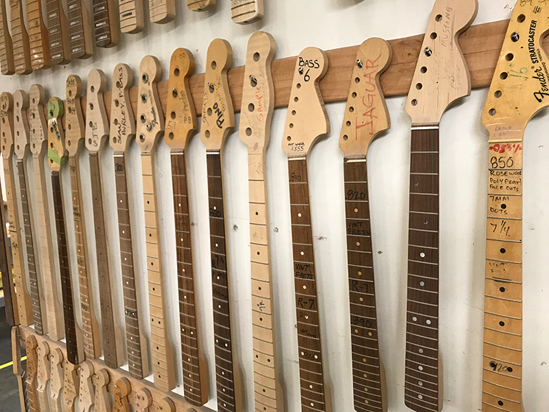 Fender necks lined up in the Fender Custom Shop