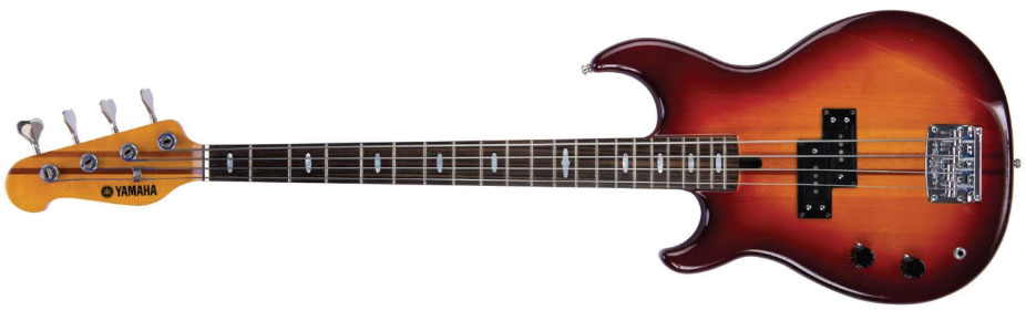 Most Expensive Left Handed Guitars Ever - Sir Paul McCartney's left handed Cherry Burst Yamaha BB-1200 electric bass guitar.