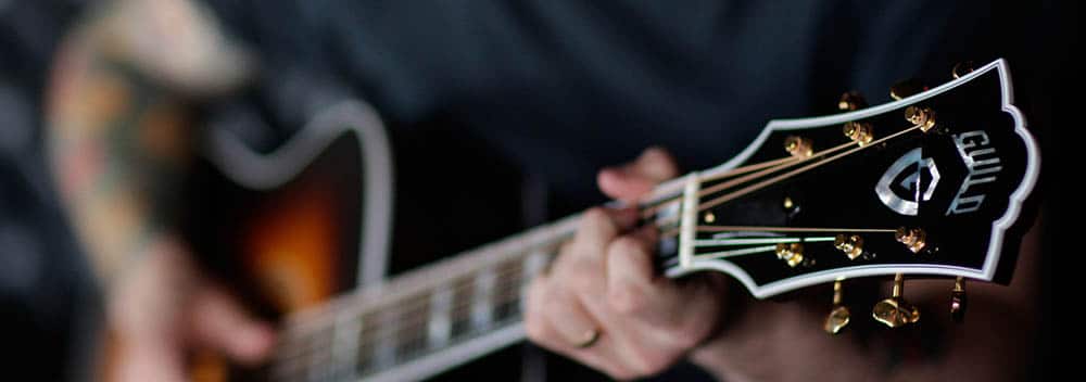 Headstock of a Guild acoustic guitar