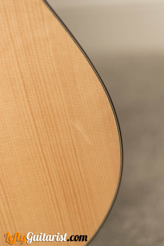 The scuff mark on my Donner DAG-1CL review guitar