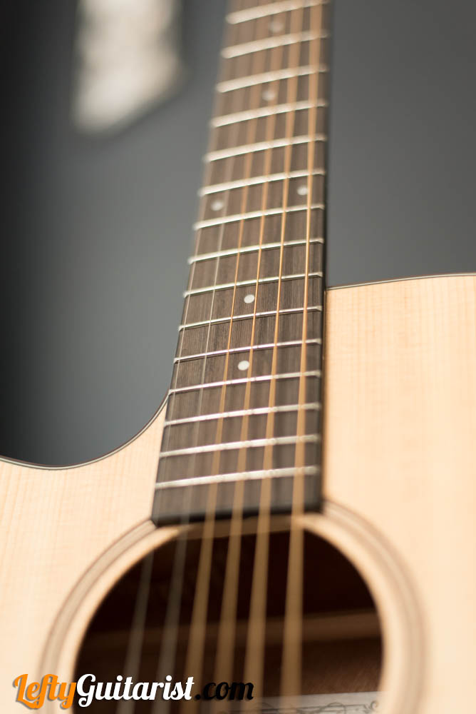 Closeup of the Donner DAG-1CL's soundhole and fingerboard