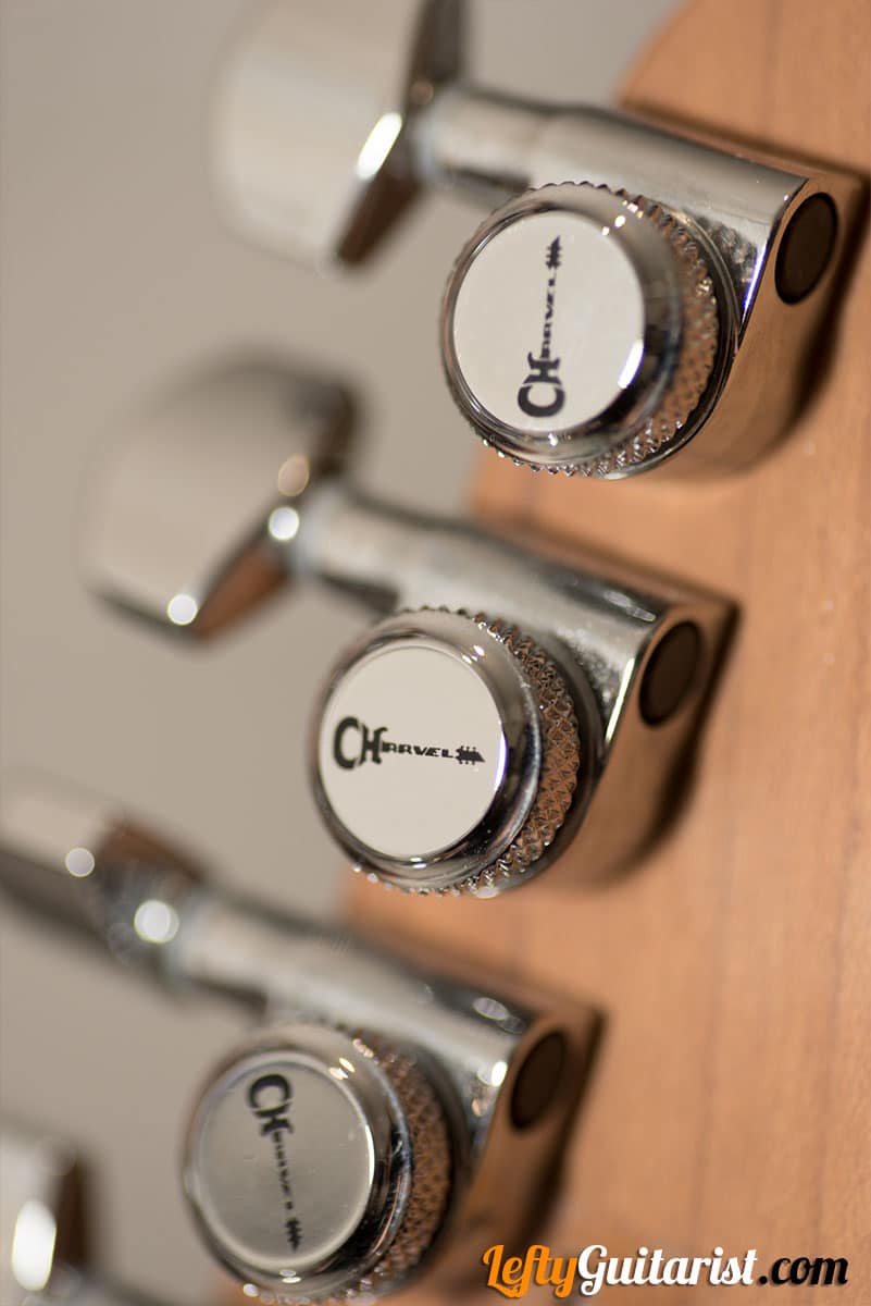 Closeup of the Charvel branded locking tuners on a left handed Pro-Mod DK24 HH 2PT CM