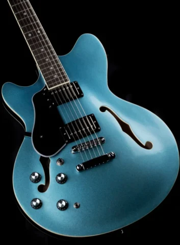 Left Handed Revelation Guitars - The body of a Revelation RT-45 with Metallic Blue finish