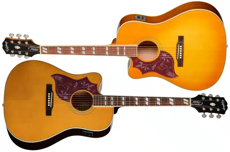 Left Handed Epiphone Acoustic Guitars - Two left handed Epiphone Hummingbird Studio EC guitars; one with a Heritage Cherry Sunburst gloss finish and the other with a gloss Natural finish.